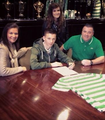 Michael Tierney with his wife Gail Tierney and son Kieran Tierney during signing